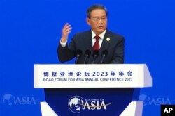 中國總理李強在海南省舉辦的博鰲亞洲論壇2023年年會開幕式上講話。（2023年3月30日）