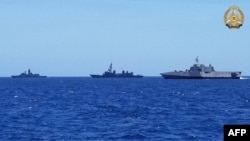 美国、菲律宾、澳大利亚和日本在南中国海首次举行联合行动。（2024年4月7日）