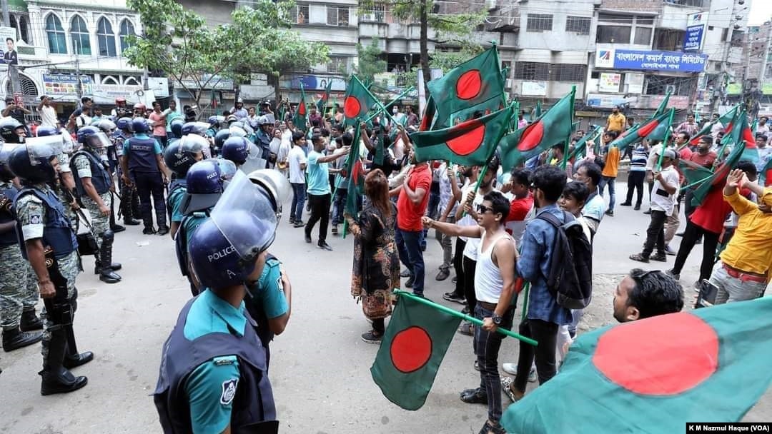 FILE - Protesters demanding resignation of Prime Minister Sheikh Hasina gather in a sit-in protest in Dhaka, July 29, 2023, as the police are trying to disperse them. 
