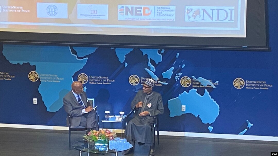 Shugaban Buhari, dama da wani jami'in cibiyar USIP a ranar Juma'a, 16 ga watan Disamba, 2022