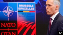NATO Secretary General Jens Stoltenberg arrives for a media conference ahead of a NATO summit at NATO headquarters in Brussels, March 23, 2022. 