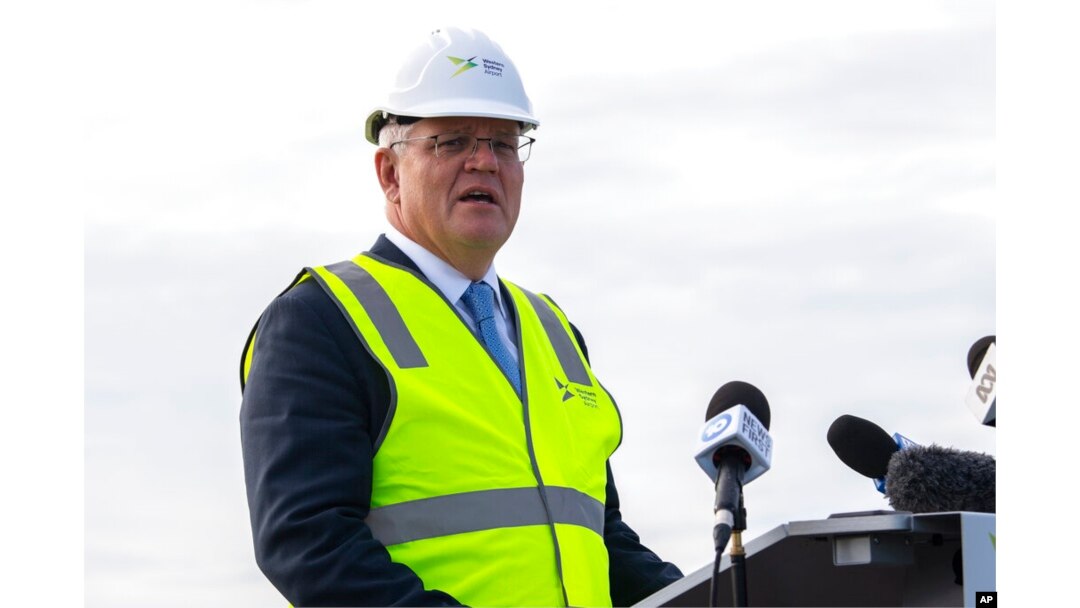 Australian Prime Minister Scott Morrison visits a new airport site in Sydney, March 28, 2022.