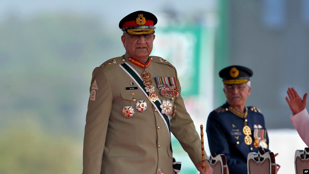 FILE - Pakistan's military chief, General Qamar Javed Bajwa, arrives to attend a military parade in Islamabad, Pakistan, March 23, 2022.