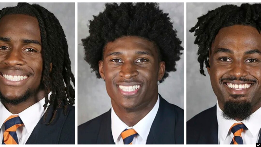 Jwe foutbol Inivesite Vijini ki mouri nan yon fiziyad Dimanch 13 Novanm: (goch a dwat) Devin Chandler, Lavel Davis Jr. ak D'Sean Perry. 