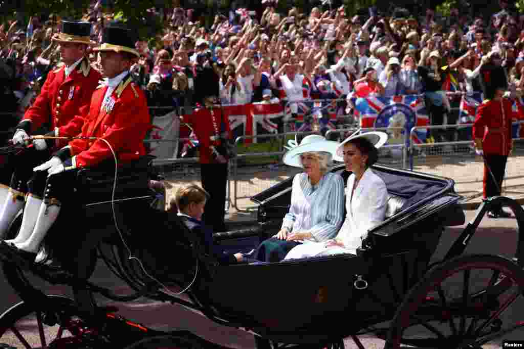 Britain's Catherine, Duchess of Cambridge and Camilla, Duchess of Cornwall ride in a carriage during the Trooping the Color parade in celebration of Britain's Queen Elizabeth's Platinum Jubilee in London, June 2, 2022.