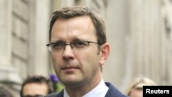 Andy Coulson, Former spokesman for Britian's Prime Minister David Cameron, leaves after giving evidence before the Leveson Inquiry into the ethics and practices of the media at the High Court in central London May 10, 2012.