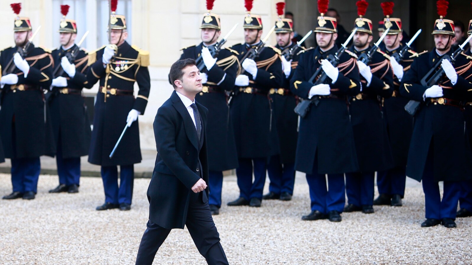 FILE - Ukrainian President Volodymyr Zelenskiy arrives to the Elysee Palace, Monday, Dec. 9, 2019 in Paris. The leaders of Russia, Ukraine, Germany and France meet to try to seek a settlement for the five-year conflict in eastern Ukraine.