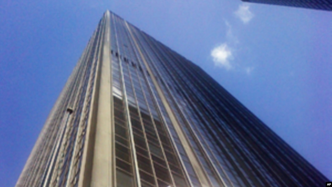 Flag at half mast by New York skyscraper where Japan's consulate is located