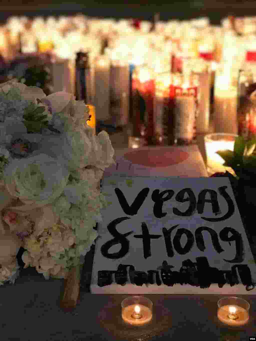 Vegas Strong sign seen at candlelight vigil for victims of Las Vegas shooting, Oct. 2, 2017. (Photo: S. Dizayee / VOA Turkish Service)