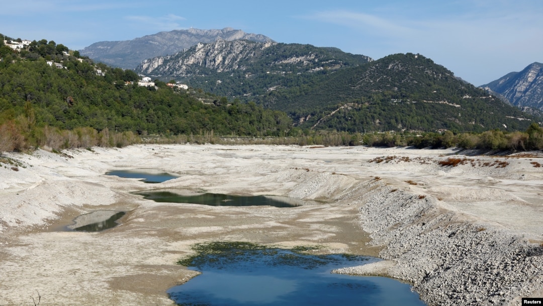 A general view shows cracked and dry earth in the dried-up artificial Broc lake in Le Broc near Nice as the Alpes-Maritimes department faces a severe drought, France, Oct. 28, 2022.