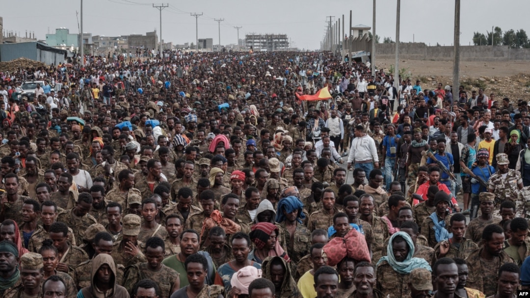 FILE - Captive Ethiopian soldiers walk towards the Mekele Rehabilitation Center in Mekele, the capital of Tigray region, Ethiopia, on July 2, 2021. 