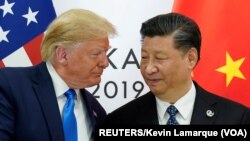 Predsednici SAD i Kine Donald Tramp i Ši Đinping na početku bilateralnog susreta na samitu G20 u Osaki, Japanu, 29. jun 2019.