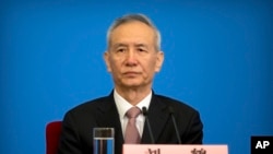 中国国务院副总理刘鹤2018年3月20日在北京见记者（美联社）