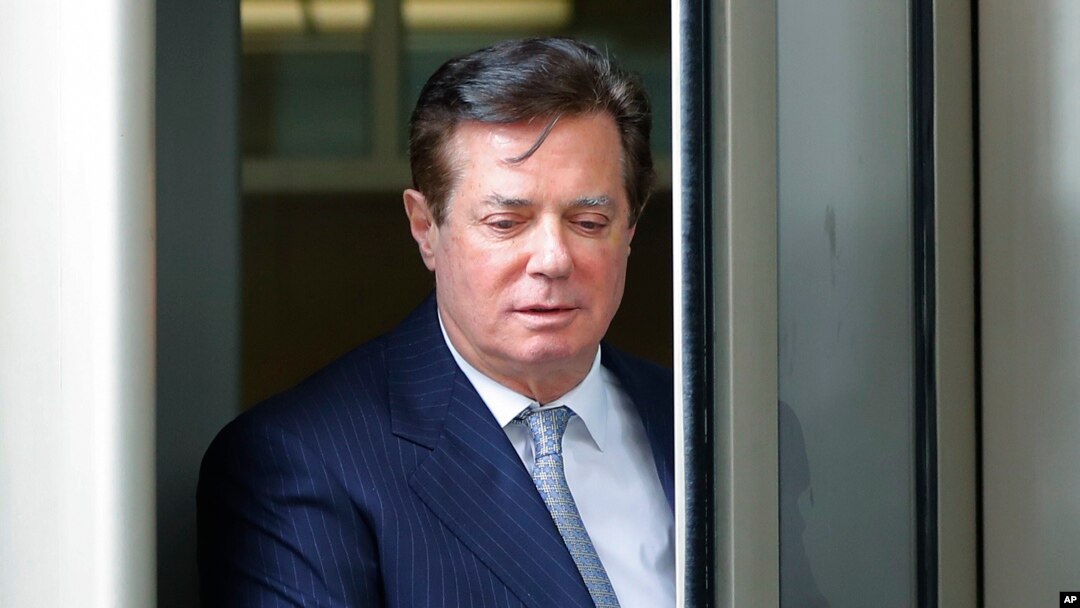 Paul Manafort, President Donald Trump's former campaign chairman, leaves the federal courthouse in Washington, Feb. 14, 2018.