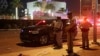 Police stand at the scene of a shooting along the Las Vegas Strip, Oct. 2, 2017, in Las Vegas. 