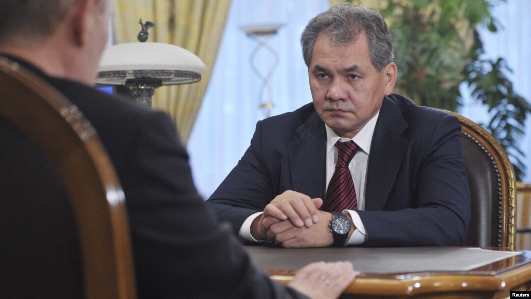 Newly-appointed Defense Minister Sergei Shoigu meets with Russian President Vladimir Putin at the Novo-Ogaryovo state residence outside Moscow, November 6, 2012. 