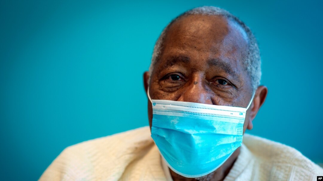 FILE - Baseball Hall of Famer Hank Aaron sits for a portrait on Jan. 5, 2021,after receiving his COVID-19 vaccination at the Morehouse School of Medicine in Atlanta. He died at the age of 86.