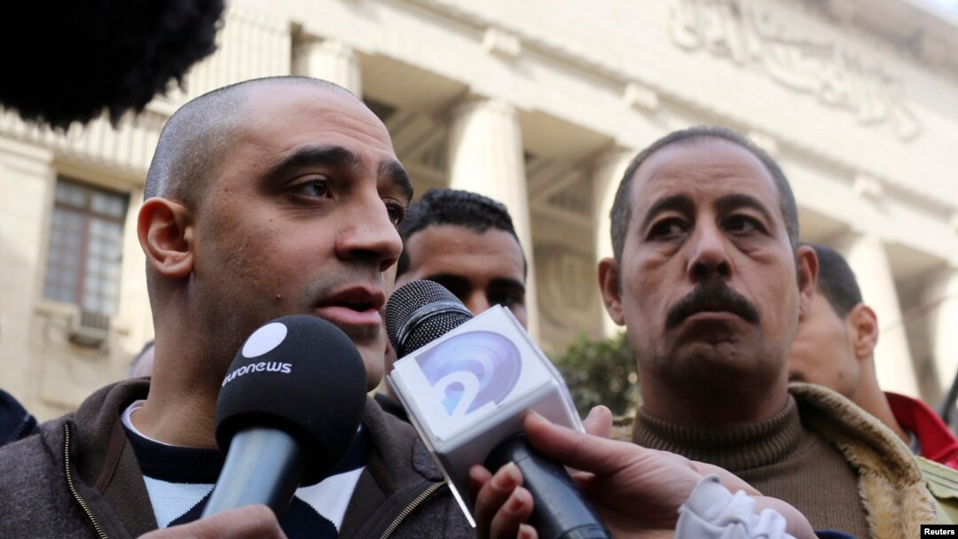 Adel, the brother of Canadian-Egyptian Mohamed Fahmy, one of the journalists working for Al Jazeera television, speaks to the media in front of a court in Cairo, January 1, 2015.