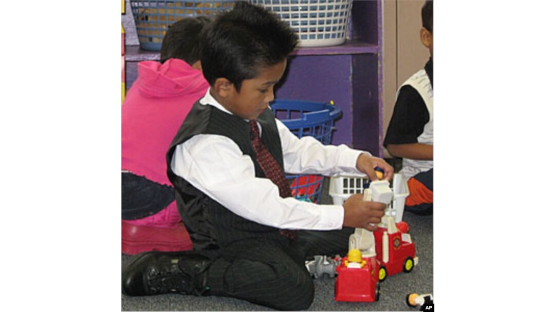 Families send their children to school in their best clothes, which doesn't stop them from playing
