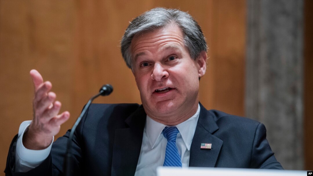 FBI Director Christopher Wray testifies during a Senate Homeland Security and Governmental Affairs Committee hearing on Capitol Hill in Washington, Sept. 24, 2020.