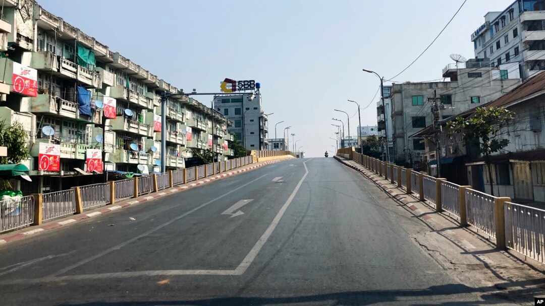A main roadway sits empty in Mandalay, central Myanmar, Feb.1, 2022.