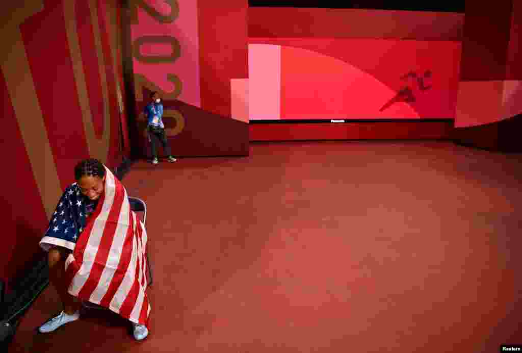 Allyson Felix of the United States celebrates after winning bronze in the women's 400 meters at the 2020 Olympics, at Olympic Stadium, Tokyo, Japan.