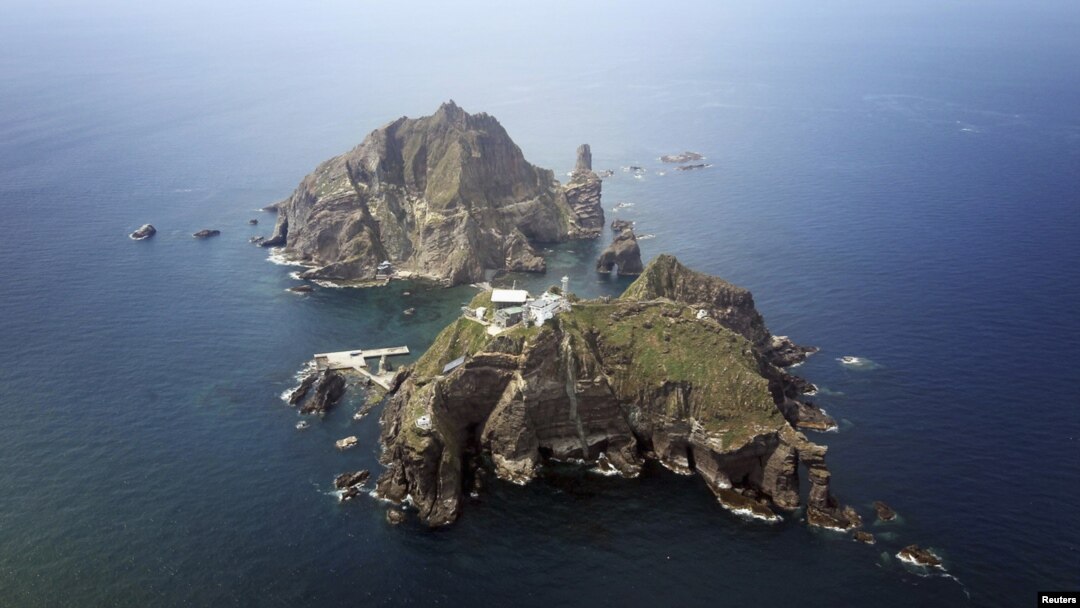 A set of remote islands called Dokdo in Korean and Takeshima in Japanese is seen in this picture taken from a helicopter August 10, 2012. 