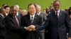 United Nations Secretary-General Ban Ki-moon, center, joins hands with President of the Democratic Congo Joseph Kabila Kabange, left, and President of Rwanda Paul Kagame at the 67th session of the General Assembly at United Nations Headquarters, Sept. 27,