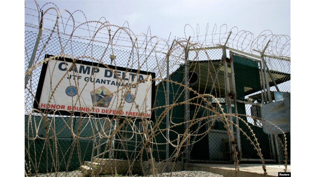 FILE - The front gate of Camp Delta is shown at the Guantanamo Bay Naval Station in Guantanamo Bay, Cuba.