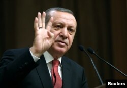 Turkey's President Tayyip Erdogan delivers a speech during his meeting with mukhtars at the Presidential Palace in Ankara, Jan. 12, 2017.