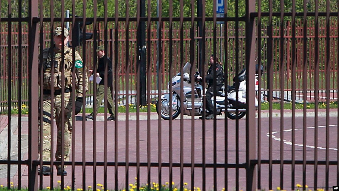 A Russian biker is seen stopped at the border between Belarus and Poland, in Terespol, Poland, April 27, 2015.