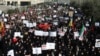Iranian protesters chant slogans at a rally in Tehran, Iran, Dec. 30, 2017. Iranian hard-liners rallied Saturday to support the country's supreme leader and clerically overseen government as spontaneous protests sparked by anger over the country's ailing 
