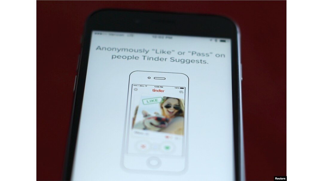 The dating app Tinder is shown on an Apple iPhone in this photo illustration taken February 10, 2016. Just in time for Valentine's Day, a survey shows that more Americans are looking for love through online dating.