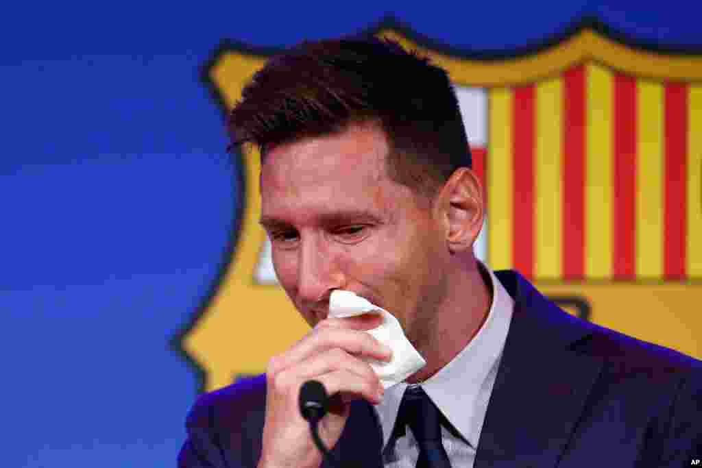Lionel Messi cries at the start of a press conference at the Camp Nou stadium in Barcelona, Spain. FC Barcelona had previously announced the negotiations with Lionel Messi had ended and that Messi would be leaving the club.