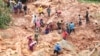 Family members dig for their son, who got buried in the mud when Cyclone Idai struck in Chimanimani about 600 kilometers southeast of Harare, Zimbabwe, March 19, 2019. 