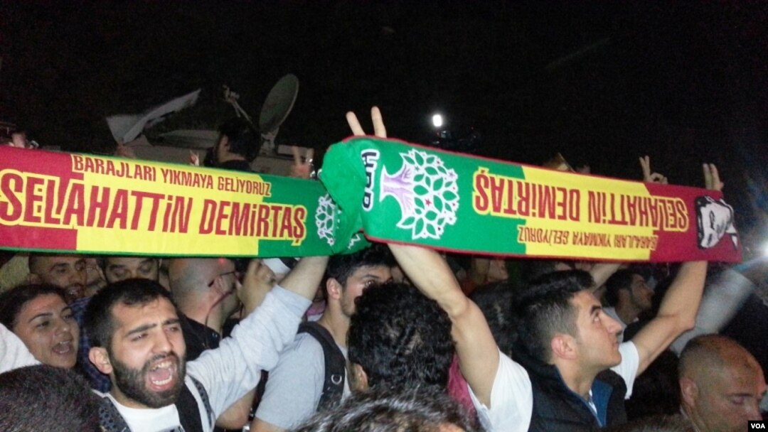 Pro-Kurdish People's Democratic Party (HDP) supporters are seen celebrating their party's strong showing, June 8, 2015, (S. Turan/VOA).