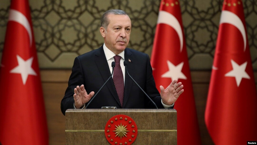 Tayyip Erdogan addresses a gathering of local leaders in Ankara, Turkey, Dec. 1, 2016.