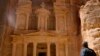 U.S. President Barack Obama stops to look at the Treasury during his tour of the ancient city of Petra, Jordan, March 23, 2013. 