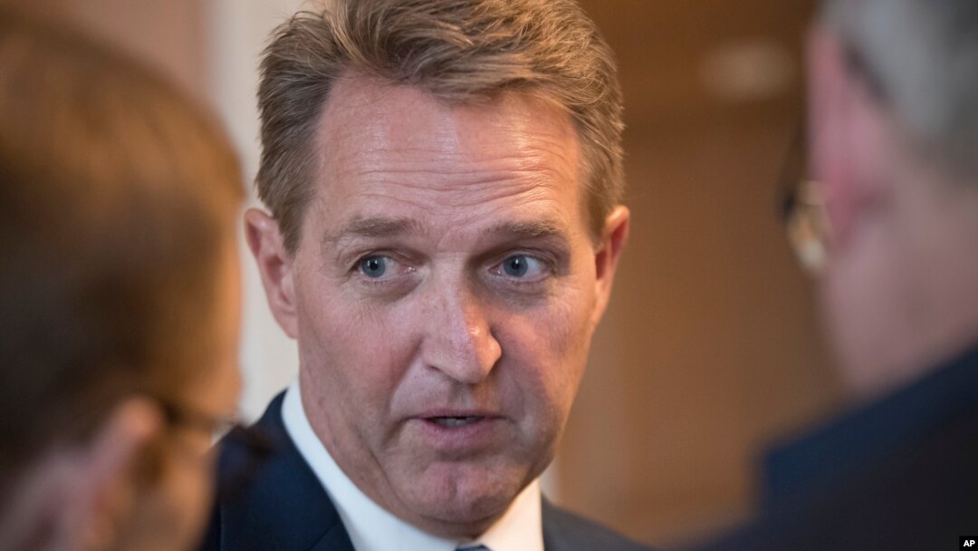 Sen. Jeff Flake, R-Ariz., who announced last year he would not run for re-election in 2018, takes questions from reporters at the Capitol in Washington, Jan. 4, 2018. 