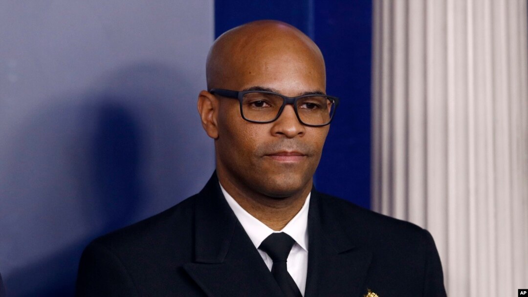 FILE - U.S. Surgeon General Jerome Adams attends a coronavirus task force briefing at the White House, in Washington, March 22, 2020. 