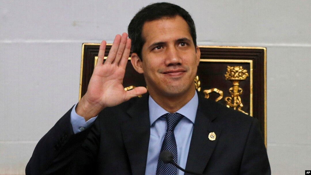 Juan Guaido, President of National Assembly and self-proclaimed interim president waves to the gallery during a session of the National Assembly in Caracas, Venezuela, April 2, 2019. 