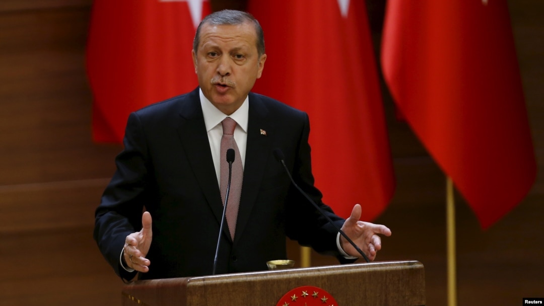 FILE - Turkish President Recep Tayyip Erdogan delivers a speech at the Presidential Palace in Ankara, Turkey, Nov. 26, 2015. 