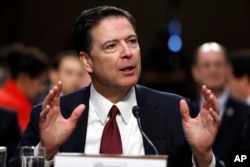 Former FBI Director James Comey testifies during a Senate Intelligence Committee hearing on Capitol Hill, June 8, 2017, in Washington.