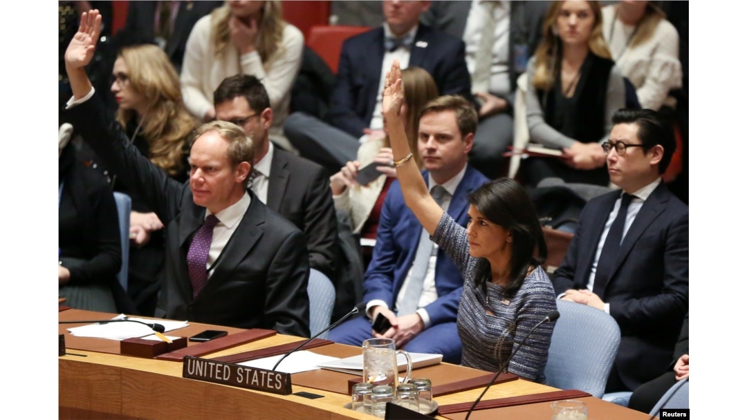 U.S. Ambassador to the United Nations Nikki Haley votes among other members of the United Nations Security Council to impose new sanctions on North Korea, at U.N. headquarters in New York, Dec. 22, 2017.