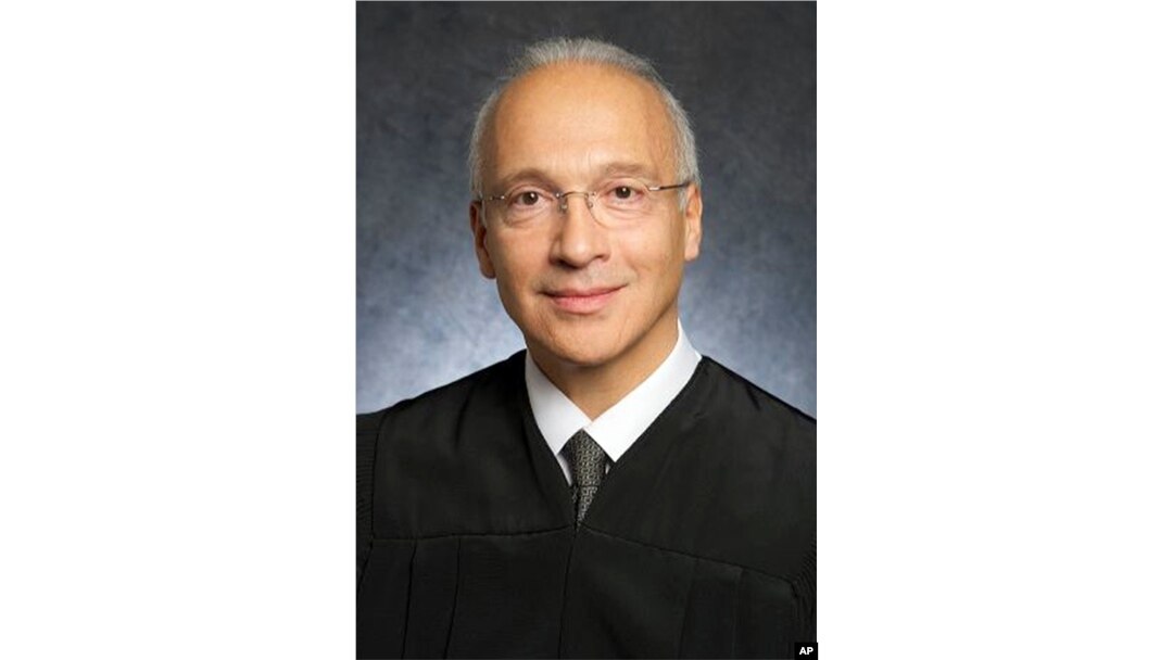 FILE - This undated photo provided by the U.S. District Court shows Judge Gonzalo Curiel.