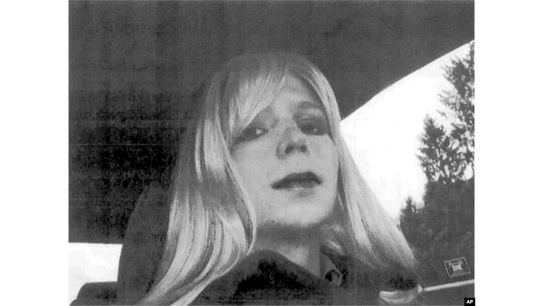 FILE - In this undated file photo provided by the U.S. Army, Pfc. Chelsea Manning poses for a photo wearing a wig and lipstick. Attorneys for the transgender soldier imprisoned in Kansas for sending classified information to the anti-secrecy website WikiLeaks.