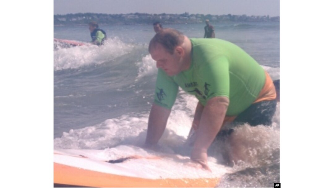 Matthew Fish - whose vision is so poor, he needs a cane to get around - learns to surf.