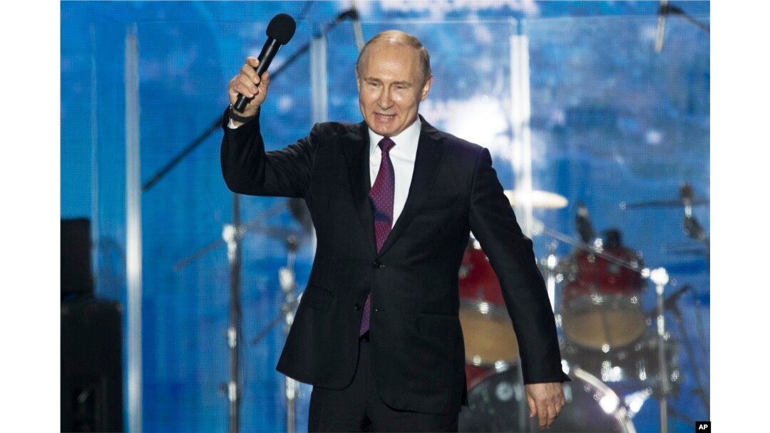 Russian President Vladimir Putin attends a concert in Sevastopol, Crimea, March 14, 2018.