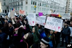 Thousands of demonstrators protest the anticipated immigration policies of president-elect Donald Trump during a march, Nov. 13, 2016, in New York.