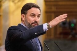 FILE - Santiago Abascal, leader of far-right party Vox, speaks at parliament in Madrid, Spain, Oct. 22, 2020.